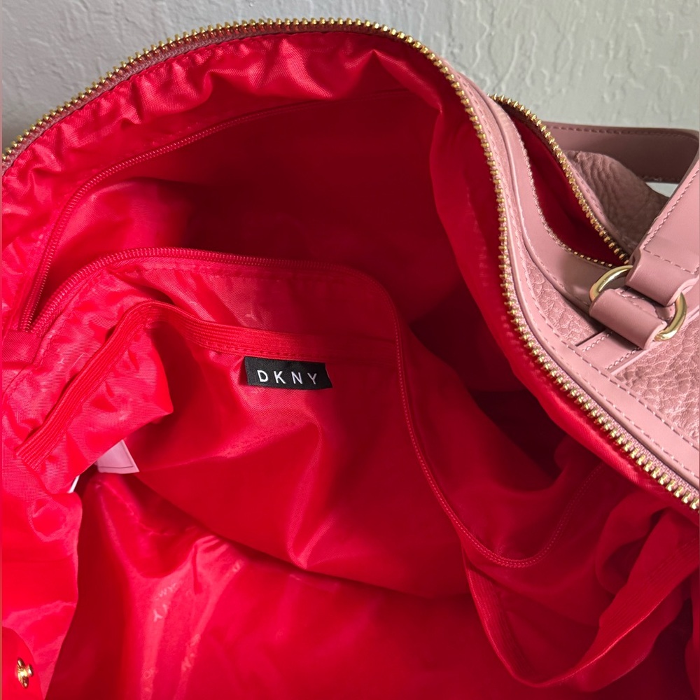 DKNY Carry-on luggage